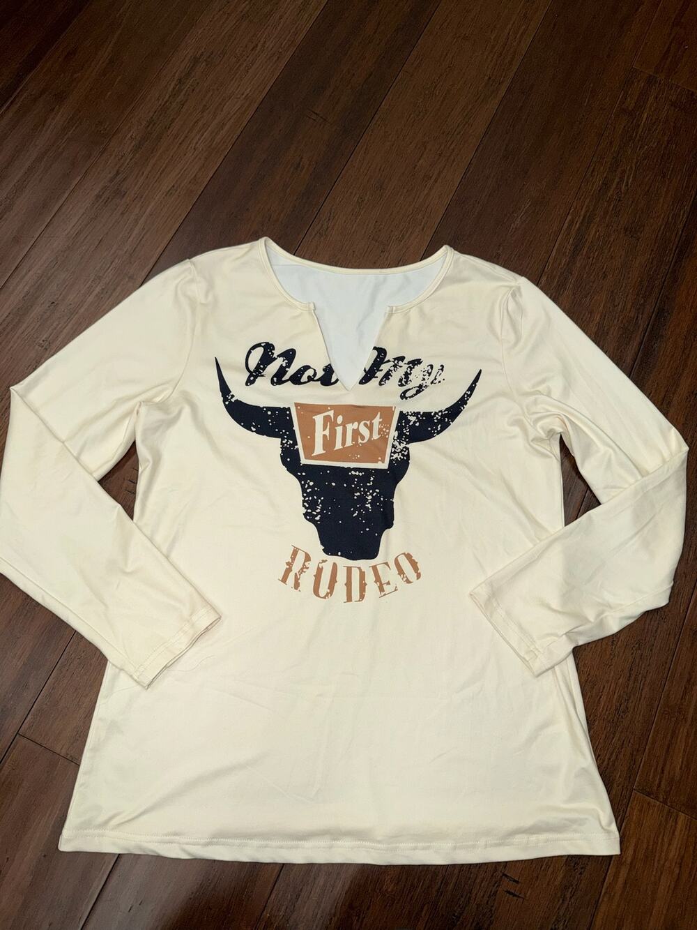 women's M western country graphic long-sleeve "Not My First Rodeo."